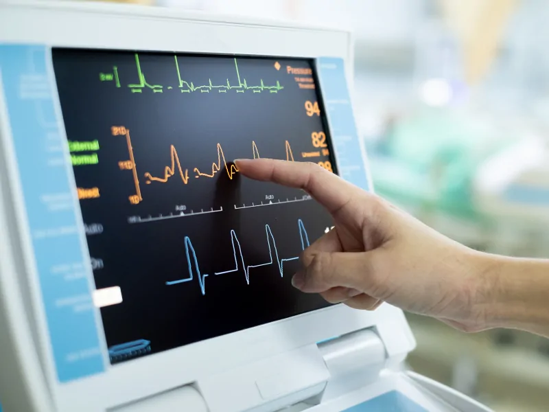 EKG technician supporting patient care